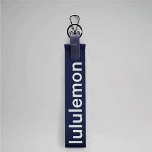 Lululemon Never Lost Keychain, Night Sea/ Delicate Mint- NWT